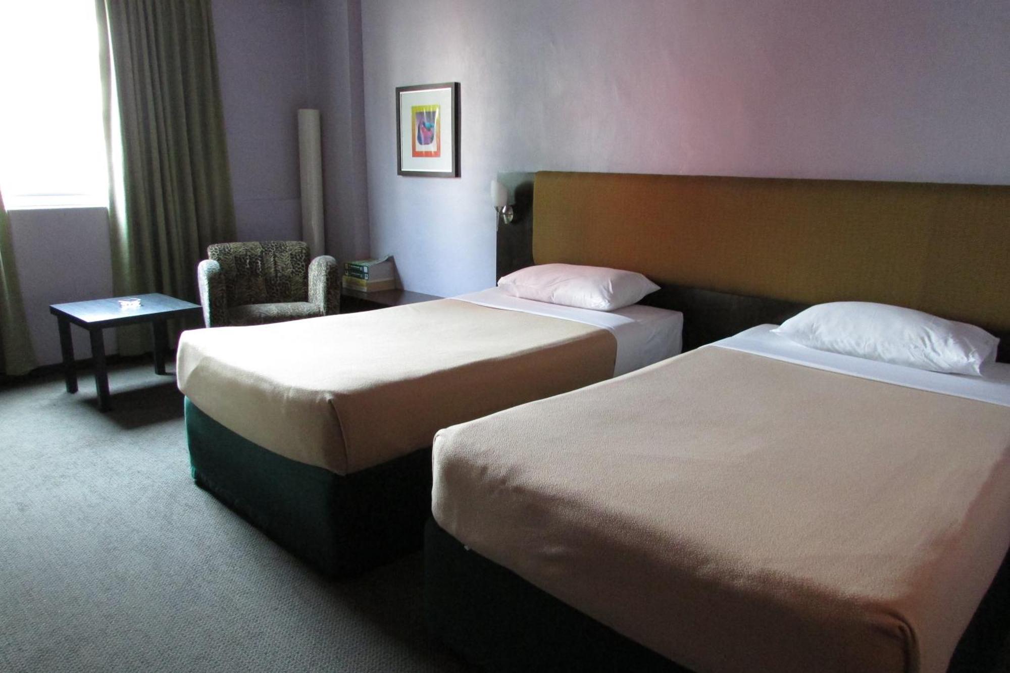 Strand Hotel Szingapúr Szoba fotó