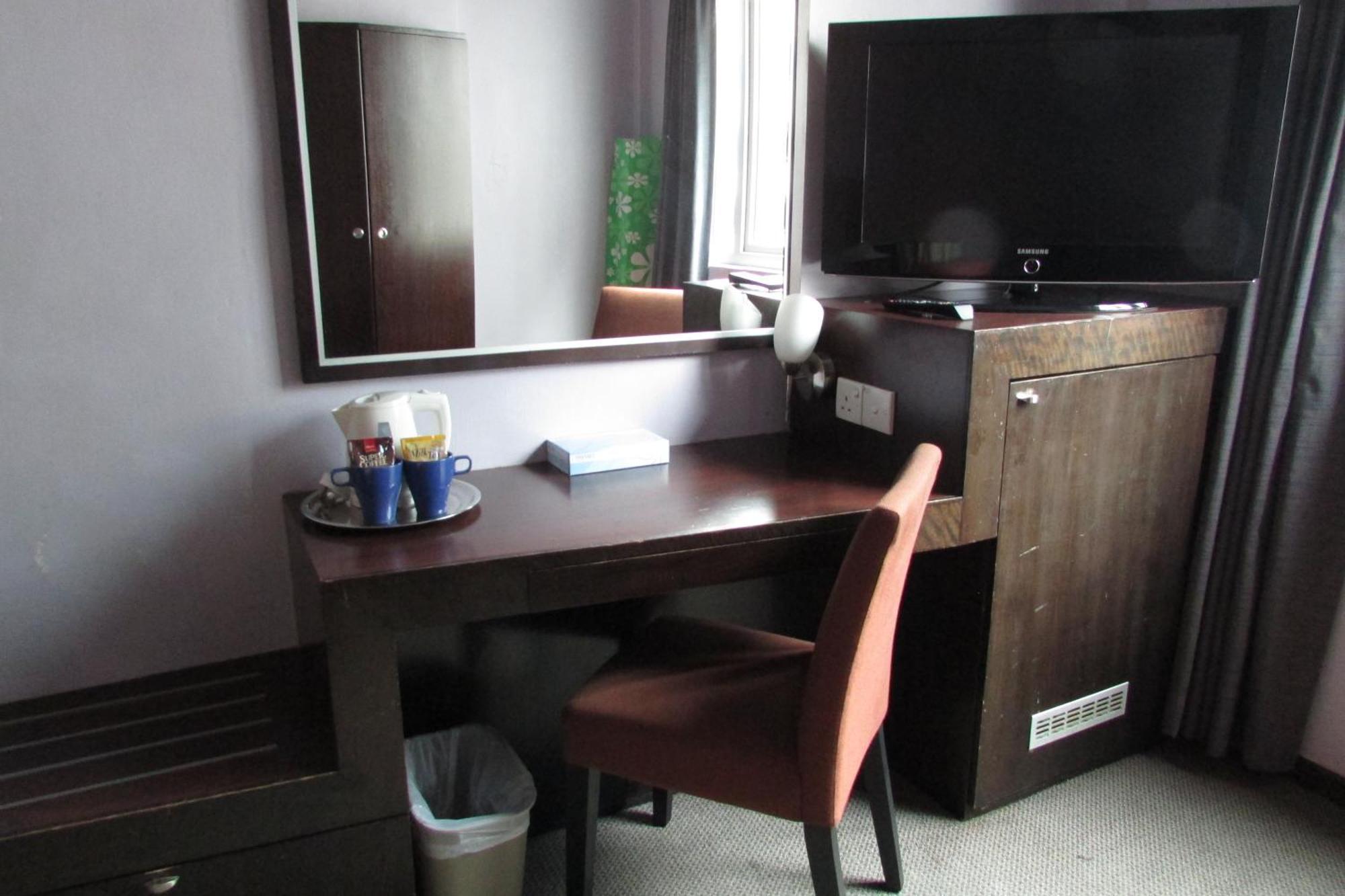 Strand Hotel Szingapúr Szoba fotó
